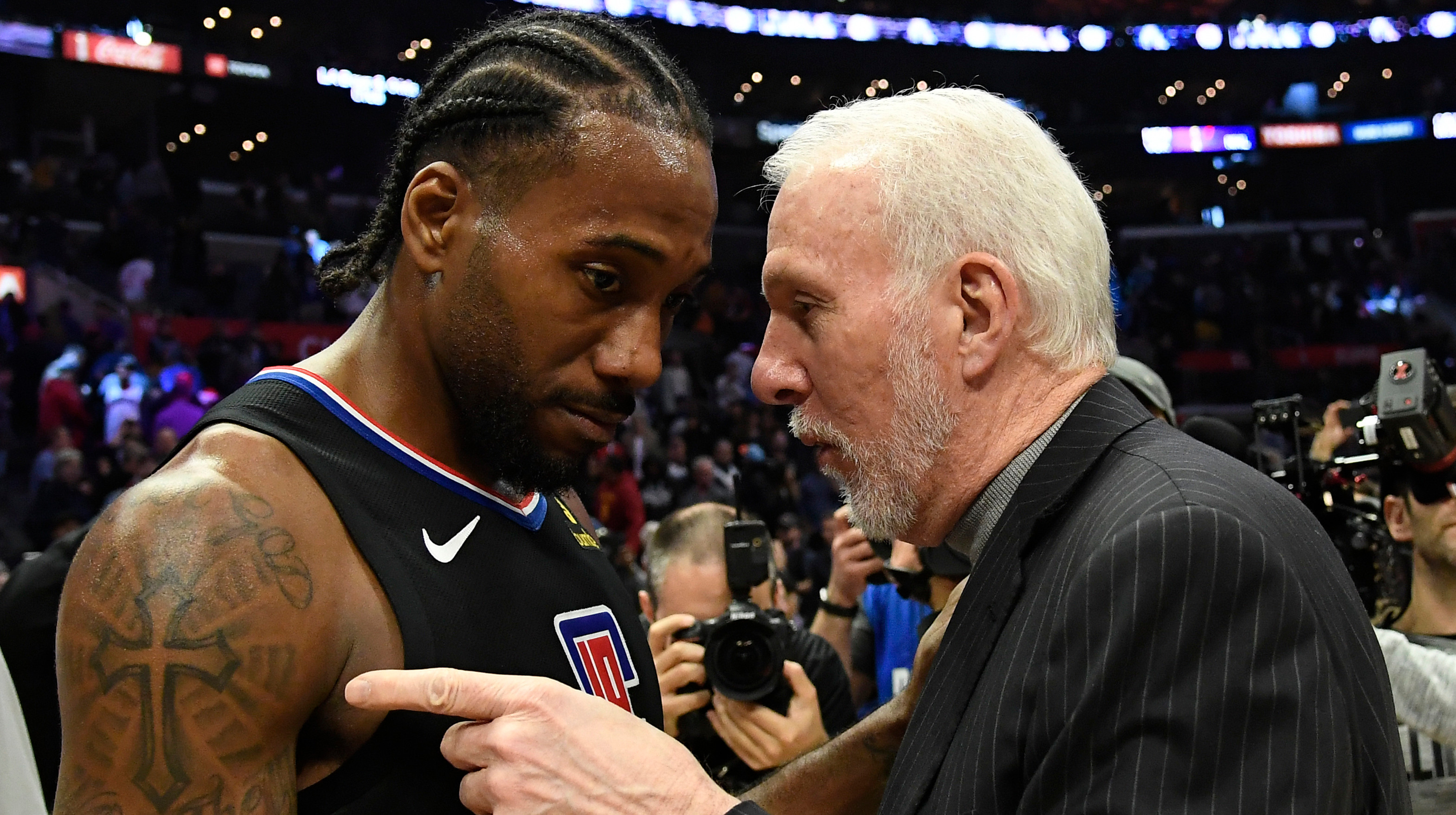 Кавай Леонард та Грегг Попович