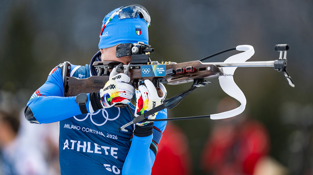 Это знак поддержки для них: Хофер – о флаге Украины на своей винтовке