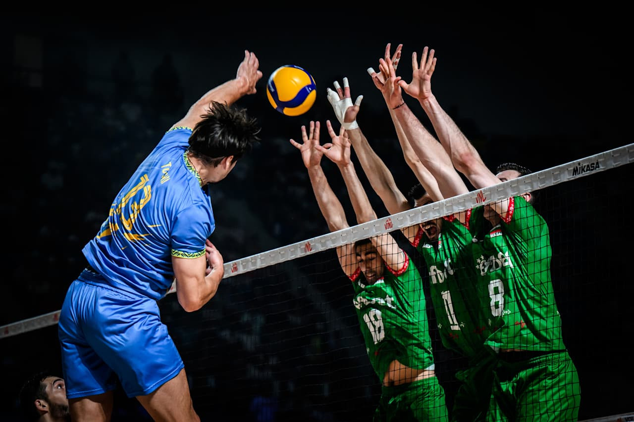 Diagonal national team of Ukraine Vasyl Tupchy attacks against the triple block