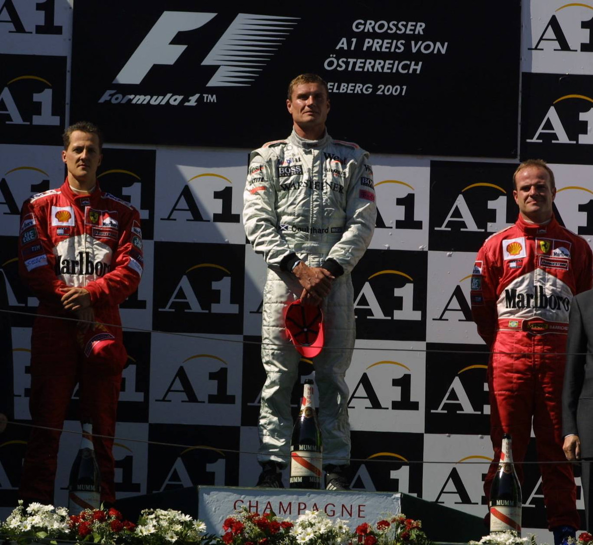Подіум Гран-прі Австрії 2001: Міхаель Шумахер (2 місце), Девід Култхард (1 місце) і Рубенс Баррікелло (3 місце)