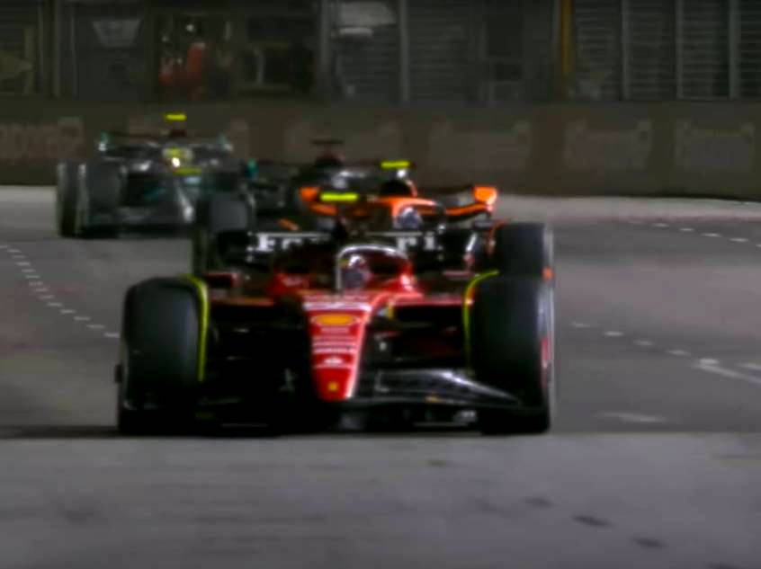Carlos Sainz and Lando Norris collectively defend from George Russell