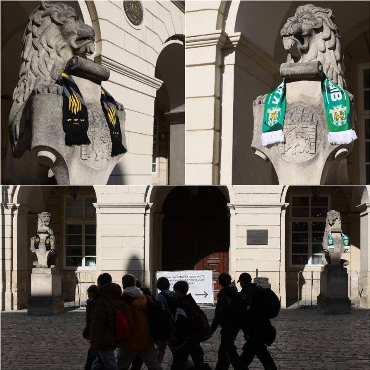 Леви біля львівської Ратуші одягнуті у клубні шалики Руха та Карпат