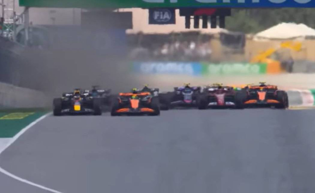 Борьба Макса Ферстаппена и Ландо Норриса на старте Гран-при Испании 2024