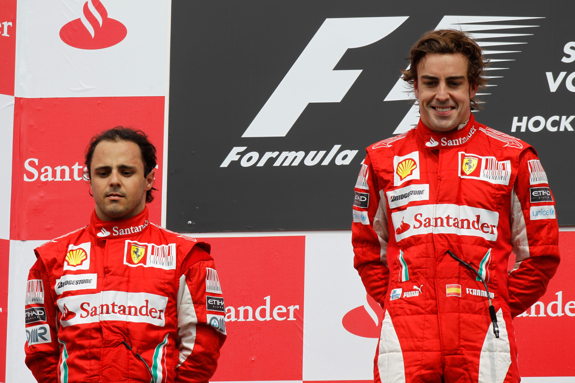 Феліпе Масса (2 місце) і Фернандо Алонсо (1 місце) на подіумі Гран-прі Німеччини 2010