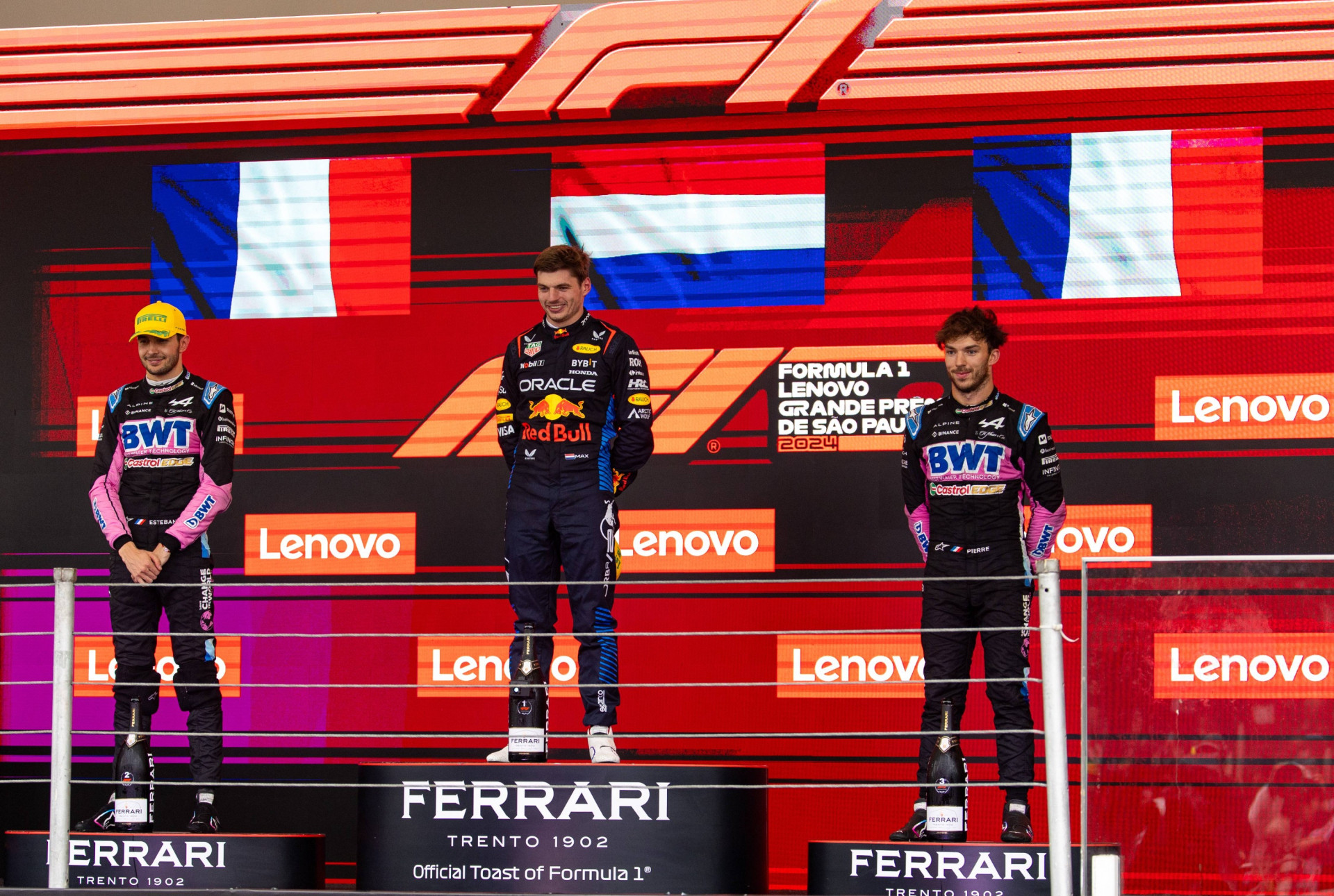 Эстебан Окон (2 место), Макс Ферстаппен (1 место) и Пьер Гасли (3 место) на подиуме Гран-при Бразилии 2024