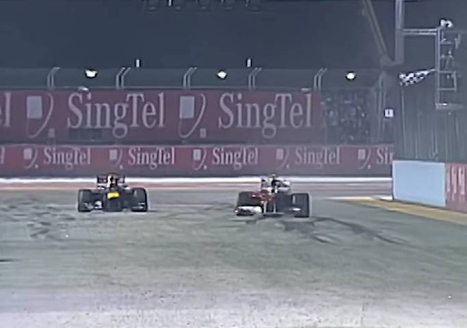 Fernando Allonoz finishes for 0.293 seconds ahead of Sebastian Vettel at Singapore Grand Prix 2010