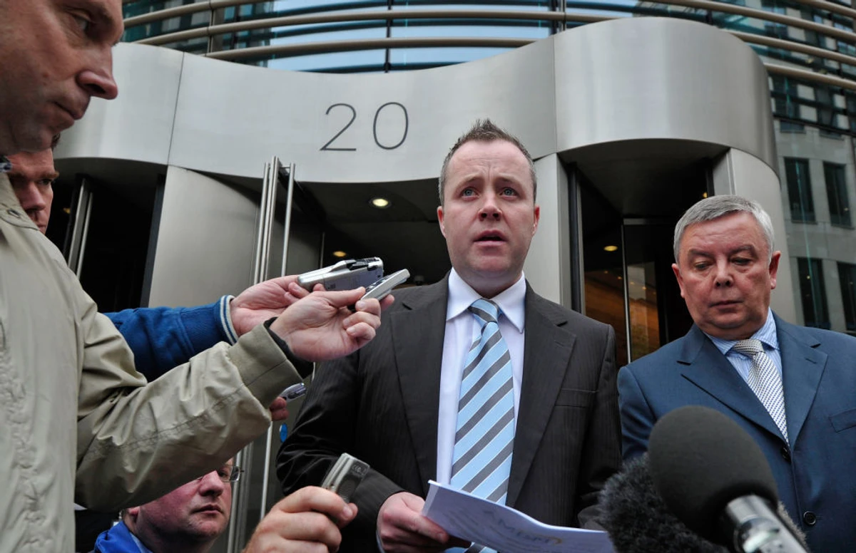 Джон після засідання суду. Вересень 2010 року.