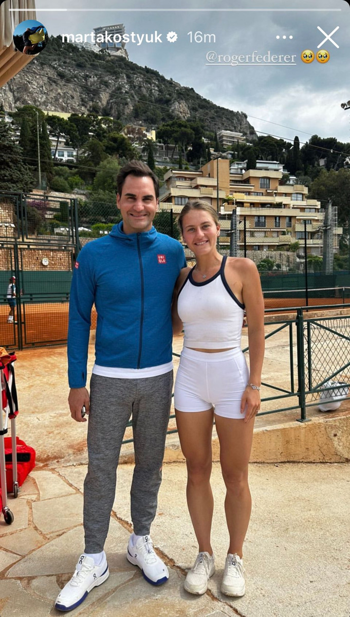 Марта Костюк з Роджером Федерером