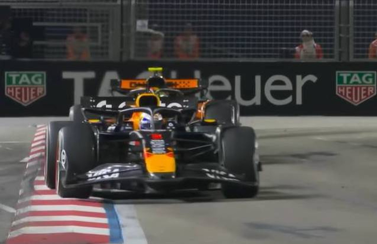 Макс Ферстаппен обороняється від Ландо Норріса на Гран-прі Сінгапуру