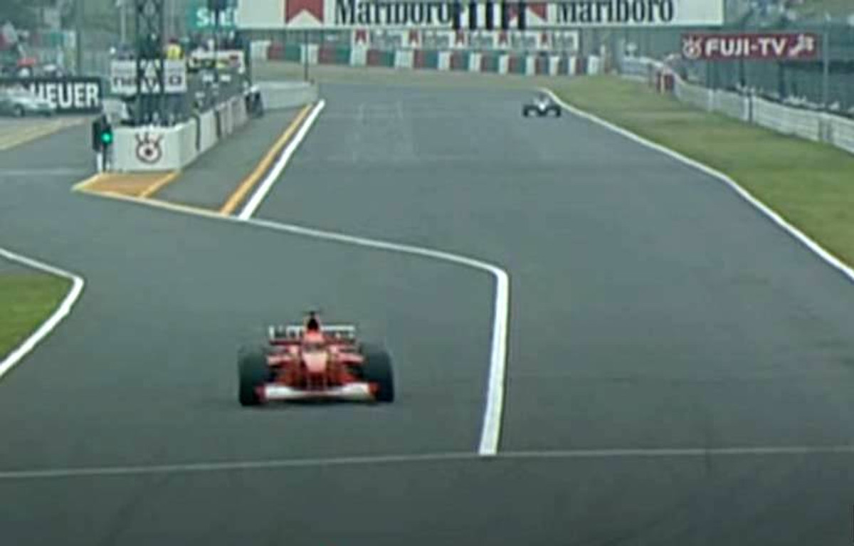 Михаэль Шумахер перехватывает лидерство за счёт стратегии на Гран-при Японии 2000